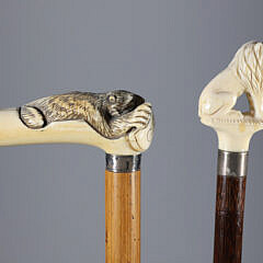 Crouching Tiger L-Grip Cane and Carved Lion Grip Walking Stick, 19th Century