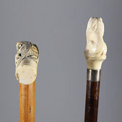 Crouching Tiger L-Grip Cane and Carved Lion Grip Walking Stick, 19th Century