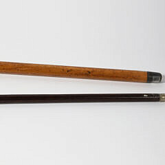 Crouching Tiger L-Grip Cane and Carved Lion Grip Walking Stick, 19th Century