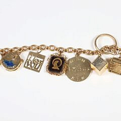 23 Piece Yellow Gold Charm Bracelet