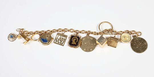 23 Piece Yellow Gold Charm Bracelet