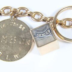 23 Piece Yellow Gold Charm Bracelet