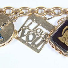 23 Piece Yellow Gold Charm Bracelet