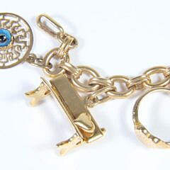 23 Piece Yellow Gold Charm Bracelet