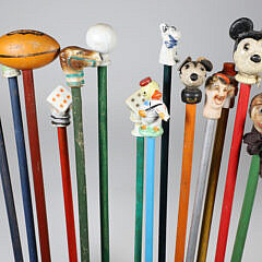Collection of 14 Porcelain and Wood Carnival Sticks