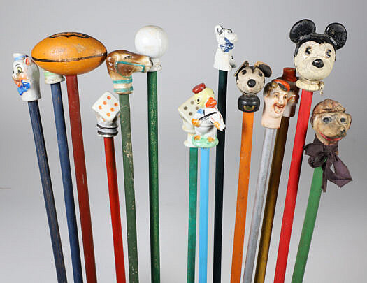 Collection of 14 Porcelain and Wood Carnival Sticks