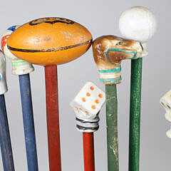 Collection of 14 Porcelain and Wood Carnival Sticks
