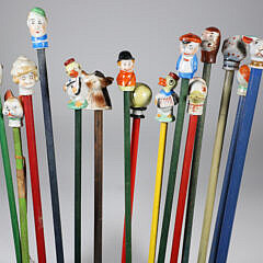 Collection of 15 Porcelain and Wood Carnival Sticks