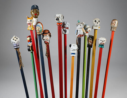 Collection of 15 Porcelain and Wood Carnival Sticks