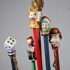 Collection of 15 Porcelain and Wood Carnival Sticks