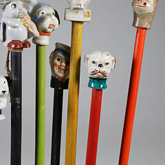 Collection of 15 Porcelain and Wood Carnival Sticks