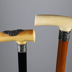 Two Sterling and Antique Ivory L-Grip Canes, 19th Century