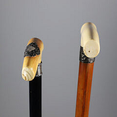 Two Carved L-Grip Canes with Sterling Collars, 19th Century
