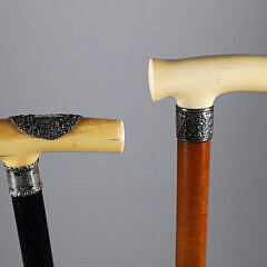 Two Carved L-Grip Canes with Sterling Collars, 19th Century