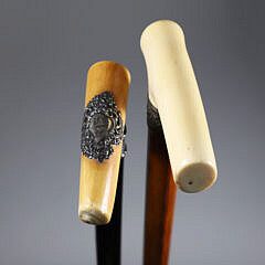 Two Carved L-Grip Canes with Sterling Collars, 19th Century