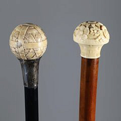 Two Carved Antique Ivory Ball Grip Walking Sticks, 19th Century