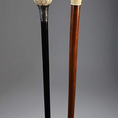 Two Carved Knob Grip Walking Sticks, 19th Century
