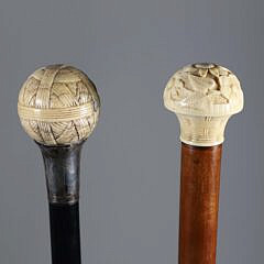 Two Carved Knob Grip Walking Sticks, 19th Century