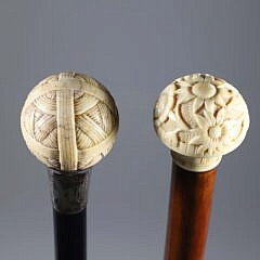Two Carved Knob Grip Walking Sticks, 19th Century