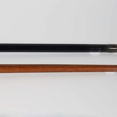 Two Carved Knob Grip Walking Sticks, 19th Century