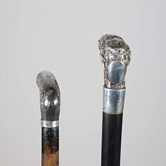 Two Repousse Sterling Silver L-Grip Canes, 19th Century
