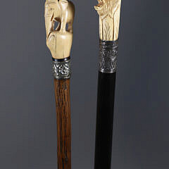 Two Antique Carved Animal Grip Walking Sticks