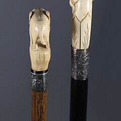Two Antique Carved Animal Grip Walking Sticks