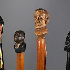 Four Carved Bust Grip Walking Sticks, 19th Century