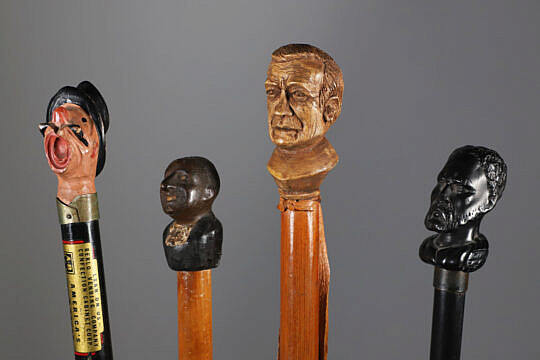 Four Carved Bust Grip Walking Sticks, 19th Century