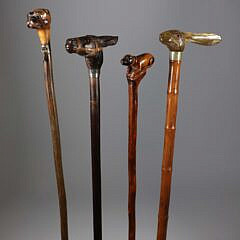 Collection of Four Antique Animal Head Grip Walking Sticks
