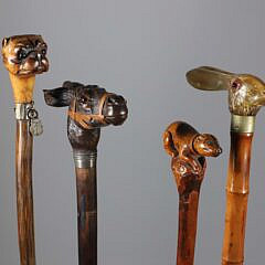 Collection of Four Antique Animal Head Grip Walking Sticks
