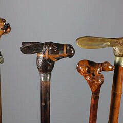 Collection of Four Antique Animal Head Grip Walking Sticks