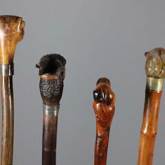 Collection of Four Antique Animal Head Grip Walking Sticks