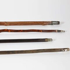 Collection of Four Antique Animal Head Grip Walking Sticks