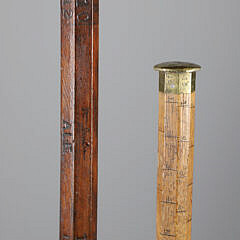 Two Lumberman Measuring Sticks