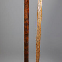Two Lumberman Measuring Sticks