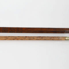 Two Lumberman Measuring Sticks