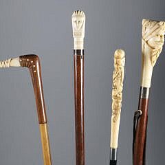 Four Various Diminutive Carved Grip Walking Sticks, 19th Century