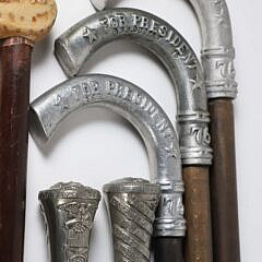 Group of Nine Miscellaneous Vintage Political Canes and Walking Sticks on Wood Shafts