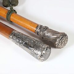 Two Repousse Sterling Silver Grip Walking Sticks, 19th Century