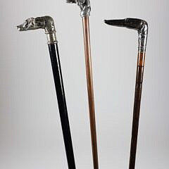 Three Vintage Metal Dog-Head Canes on Wood Shafts