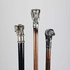 Three Vintage Metal Dog-Head Canes on Wood Shafts