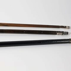 Three Vintage Metal Dog-Head Canes on Wood Shafts