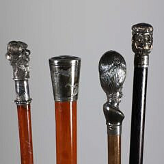 Four Vintage Silvered Metal Grip Walking Sticks