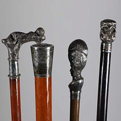 Four Vintage Silvered Metal Grip Walking Sticks