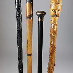 Four Assorted Metal and Wood Walking Sticks