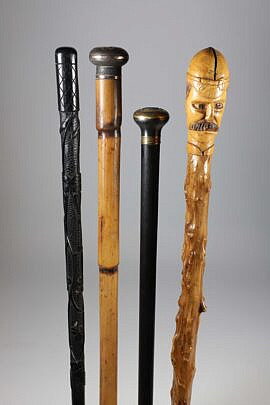 Four Assorted Metal and Wood Walking Sticks