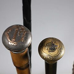 Four Vintage Assorted Metal and Carved Wood Walking Sticks