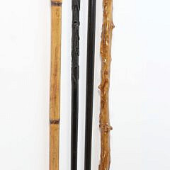 Four Vintage Assorted Metal and Carved Wood Walking Sticks