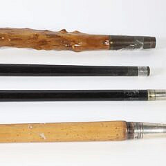 Four Vintage Assorted Metal and Carved Wood Walking Sticks